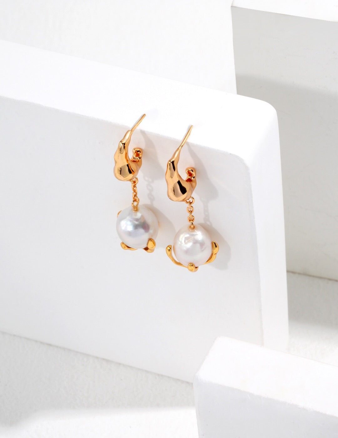 Gold-plated Dangle Teardrop Pearl Earrings featuring natural freshwater pearls and artistic drop design, perfect for elegant occasions.