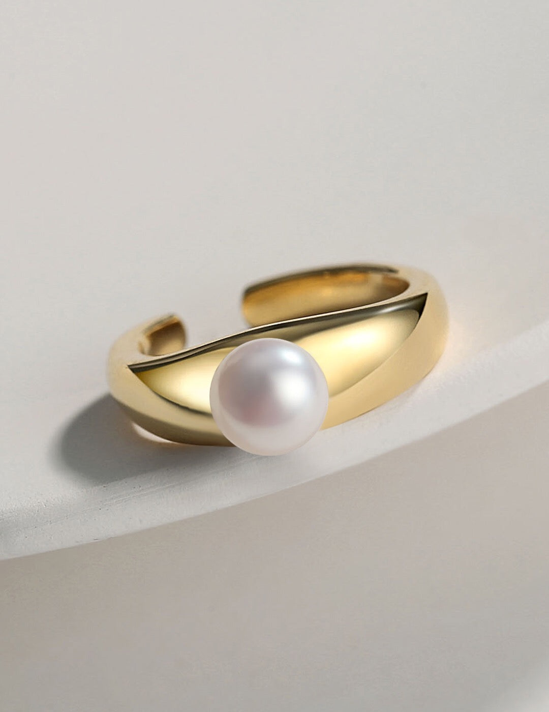 Gold Vermeil Pearl Ring featuring a lustrous freshwater pearl on an open tail band. Tarnish-resistant and hypoallergenic design for elegant wear.