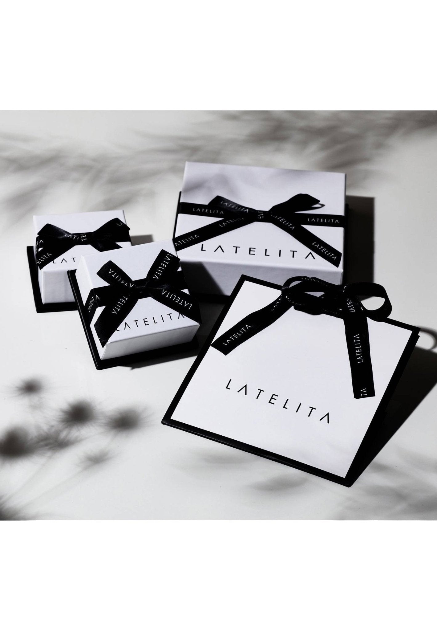 Luxury LATELITA gift boxes in various sizes with black ribbon, ideal for presenting the Beatrice Oval Gemstone Pendant Necklace Rose Gold Pink Tourmaline.