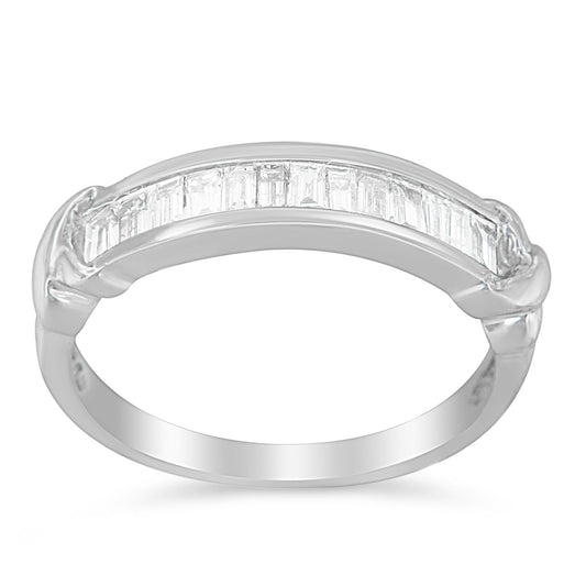 Sterling silver wedding ring with baguette cut diamonds in a half-station design. Elegant diamond band for fine jewelry and special occasions.