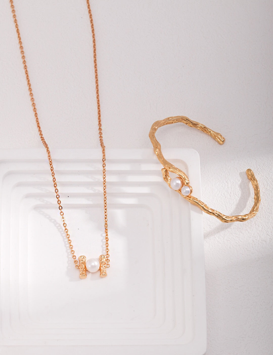 Double-Pearl Cuff Bracelet and matching necklace set featuring freshwater pearls and gold vermeil, ideal for elegant jewelry collections.