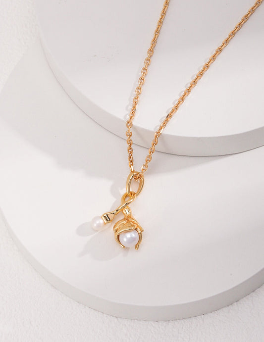 Gold Pearl Pendant Necklace with handmade natural pearl on 18k gold-plated chain. Elegant hypoallergenic jewelry for everyday or gifting.