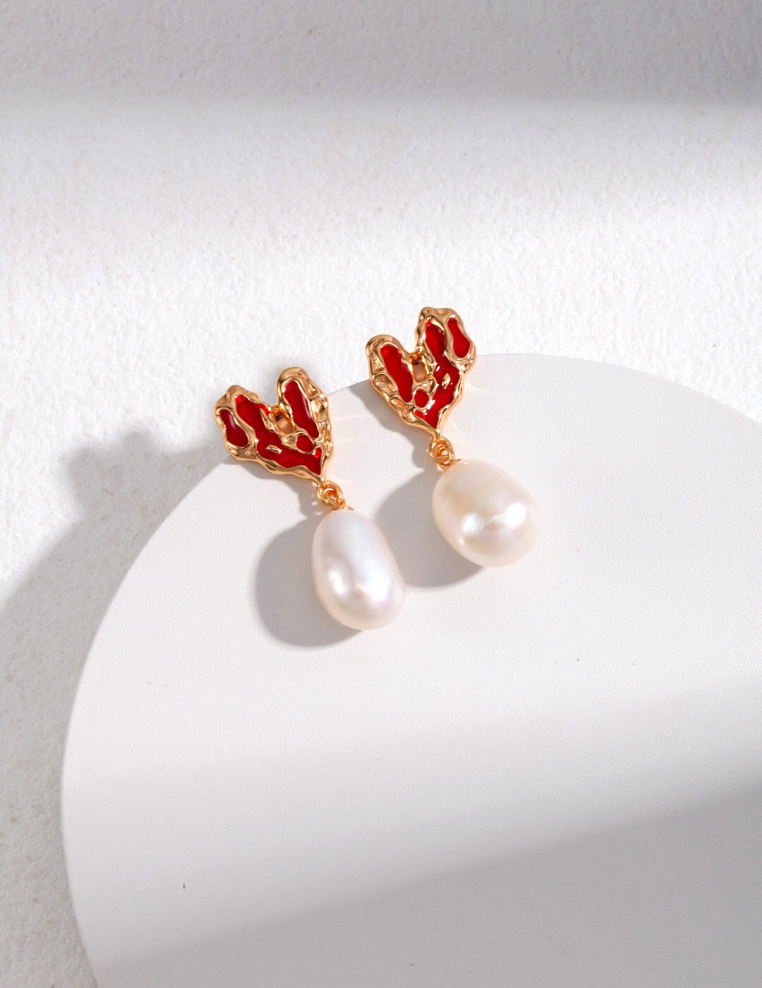 Heart Pearl Earrings with red enamel heart tops and freshwater pearl drops, 18k gold-plated, handmade and hypoallergenic.