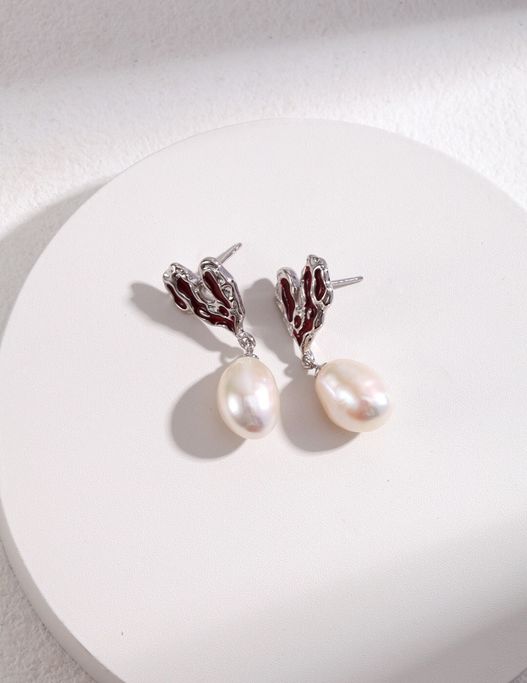 Heart Pearl Earrings in silver-tone with red enamel heart tops and freshwater pearls, hypoallergenic and handcrafted design.