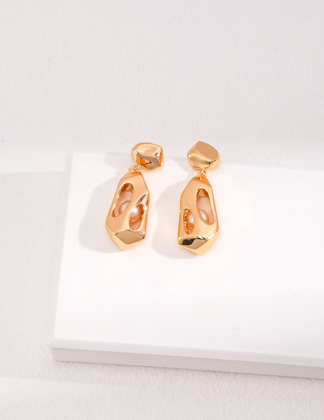 Unique Pearl Earrings in gold with openwork design and freshwater pearls, handmade and tarnish-resistant for elegant drop earring style.
