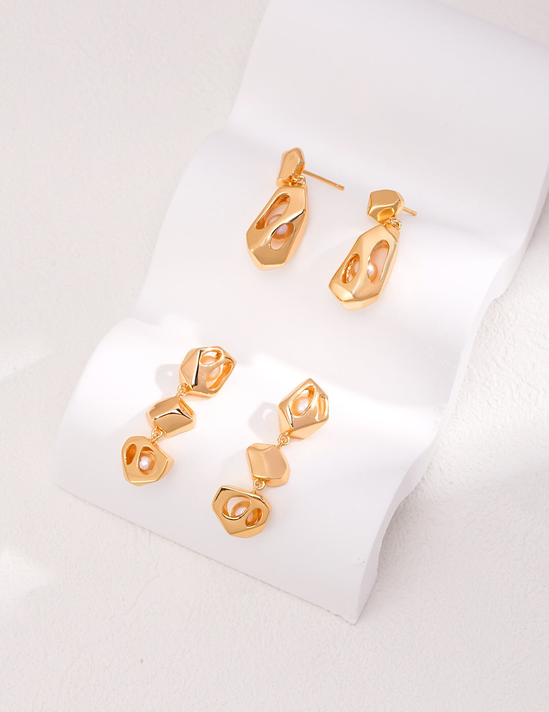 Set of handmade gold openwork pearl earrings in two styles, featuring freshwater pearls and 18k gold-plated tarnish-resistant finish.