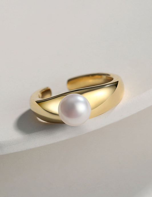 Gold Vermeil Pearl Ring featuring a lustrous freshwater pearl on an open tail band. Tarnish-resistant and hypoallergenic design for elegant wear.