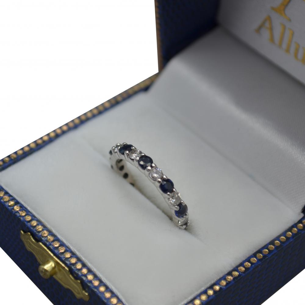 Close-up of Eternity Diamond and Blue Sapphire Ring Band 14k White Gold (2.35ct) in Allurez box, highlighting gemstone brilliance and craftsmanship.